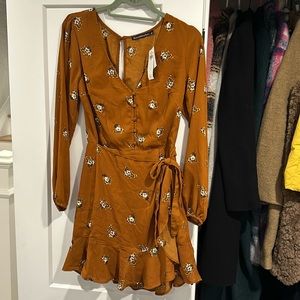Abercrombie Mini long sleeve wrap dress. Never worn new with tags size small.